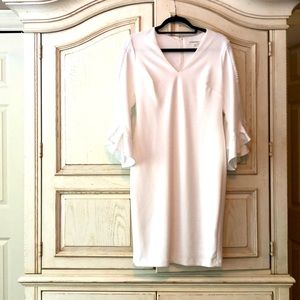 Bright white dress with pretty design on sleeves